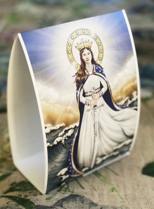 A Table Tent with an image of the virgin mary on it.